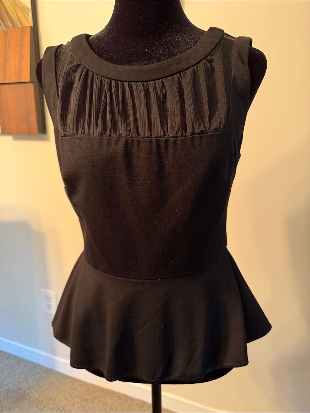 bebe Black Sleeveless Peplum Top with Pleated Yoke